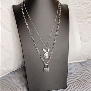 Silver Playboy and lock necklace